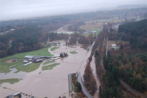 Farmlands are flooded while most structures are protected. Image courtesy of Dennis Dixon, CFM, Pierce County Public Works - Surface Water Management image